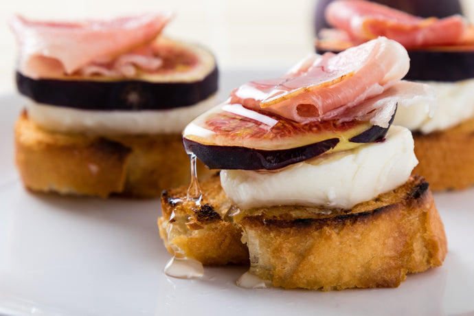 Honey Ham Fig and Mozzarella Crostini